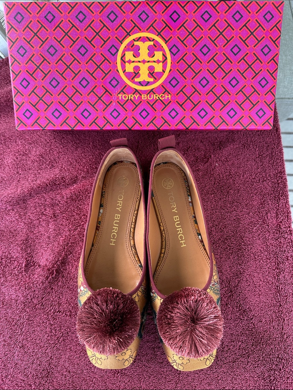 Tory Burch Gold Floral Jacquard Flats with Mauve Pom-Poms